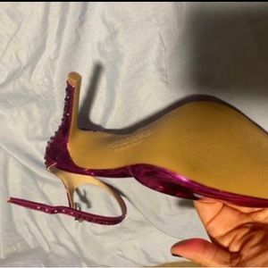 Fuchsia pink decorated high heels shoes
